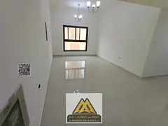 2BR in Al Nuaimiya 1, balcony, 2 baths, wardrobes, central AC, AED 41,997, 4 cheques.
