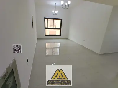 2BR in Al Nuaimiya 1, balcony, 2 baths, wardrobes, central AC, AED 41,997, 4 cheques.