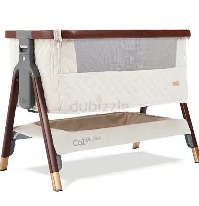 Tutti Bambini CoZee next to me crib