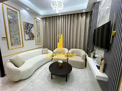 Luxury apartment, second tenant. One bedroom and living room with an open view. Ajman Garden City. F