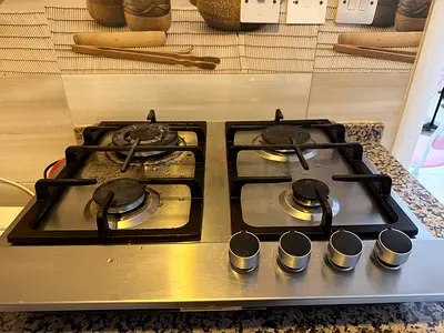 Built-in 4-burner stainless steel gas hob (used) - good working condition
