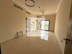 1BR first tenant super deluxe in Al Rashidiya 1 Ajman, near Port Street, balcony, 2 bathrooms, centr