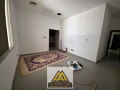 Large studio apartment with a semi-detached kitchen, ground floor, in Al Rawda 1 area, close to all services and main roads