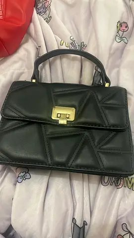 Black structured top-handle handbag with gold clasp