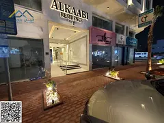 Two-bedroom apartment with a living room and three bathrooms, directly on Sheikh Ammar Street, Ajman