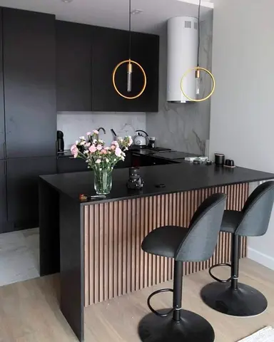 Modern Kitchen Island with Black Countertop and Slatted Wood Detail