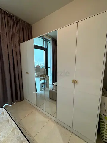 White glossy 6-door wardrobe with mirrored panel - good condition