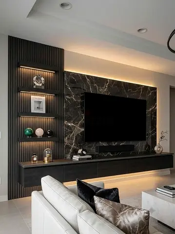Modern built-in entertainment center with marble feature wall and floating console