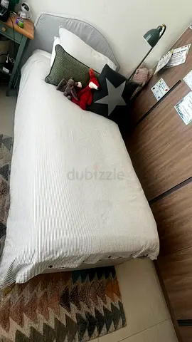 Single bed with headboard  - good condition (mattress and bedding not included)