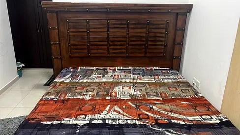 Solid Wooden Double Bed with Decorative Headboard - Good Condition