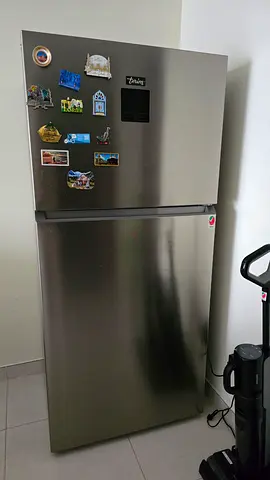 Silver refrigerator in good working condition