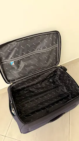 Medium soft-shell suitcase / carry-on with wheels - good condition