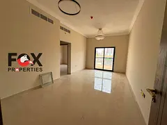 One-bedroom apartment with a living room for annual rent in Al Rashidiya 1 area, new building, first