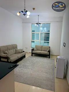 One-bedroom apartment with a living room for sale in City Tower; down payment of 197,000 AED and a m