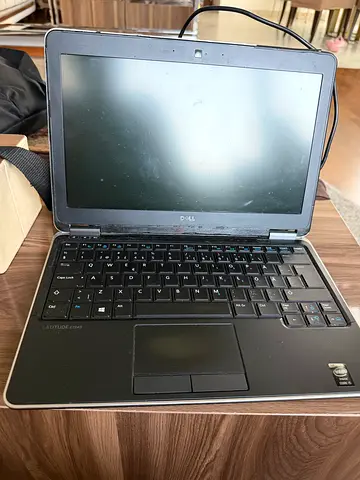 Used Dell Latitude laptop - for parts or repair
