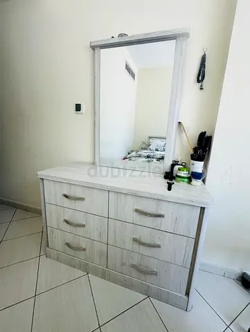 Light wood 6-drawer dresser with mirror - good condition