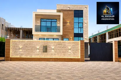 Modern villa with 4 master bedrooms and a swimming pool in Al Helio 2, Ajman | Registration fees included | Electricity and water fees included