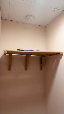 Wall-mounted wooden storage shelf — sturdy DIY shelving