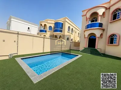Spacious residential villa in Muwaileh - 5 bedrooms, Majlis, maid's room, and a swimming pool, for 130,000 AED per year. Negotiable