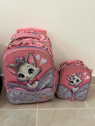 Pink kids school backpack and matching lunch bag set.