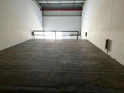 Location: Al Bahia – Ajman. Brand-new warehouse. Area: 2,900 sq. ft. Includes a mezzanine floor for optimized space utilization. Electricity: 30 kW.
