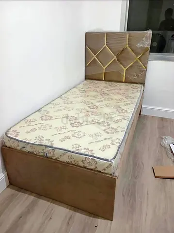 Single bed with mattress and upholstered headboard - like new
