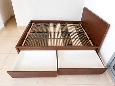 IKEA queen bed with 4 storage drawers for sale
