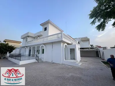 Two-story villa with ten rooms and kitchens in Al Nakheelat