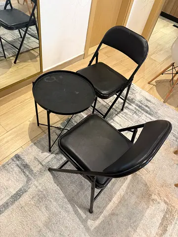 Balcony table set: 2 foldable chairs and 1 black metal coffee table