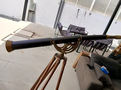 Vintage-style Brass Telescope on Wooden Tripod
