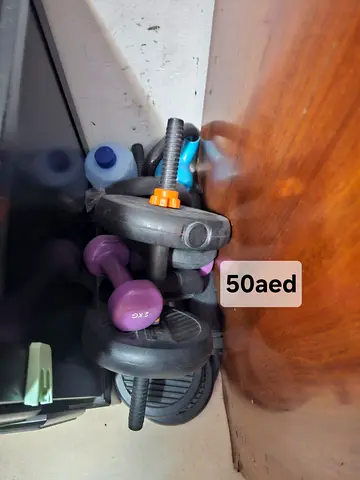 Set of dumbbells with weight plates and bars - used, 40 AED