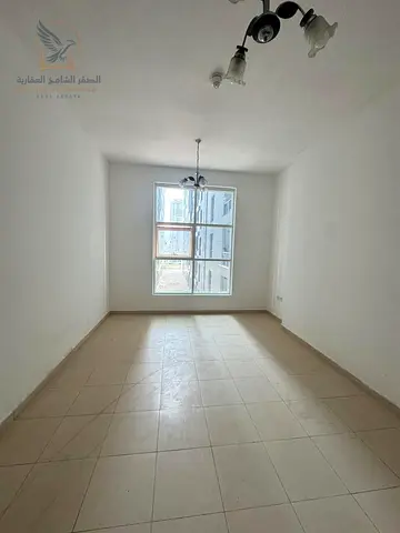 غرفة وصالة للايجار السنوي  في قلب عجمان في ابراج السيتي تاور  مقابل جرند مول وبجور السفير مول موقع ممتاز امتداد شارع الشيخ خليفة