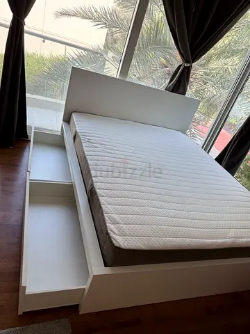 IKEA Malm Queen Size storage bed frame with IKEA mattress available in excellent condition