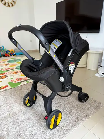 Doona+ Infant Car Seat (Nitro Black) - Converts to Stroller