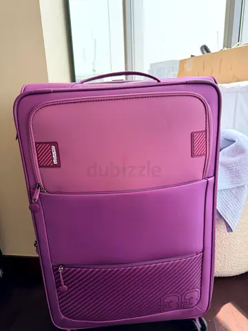 American Tourist (large travel suit case)