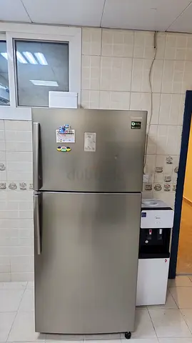 Silver double-door top-freezer refrigerator - good working condition