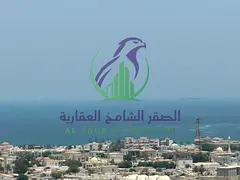 For annual rent: A luxurious four-bedroom apartment with a living room in Al Majaz 3, offering a ful