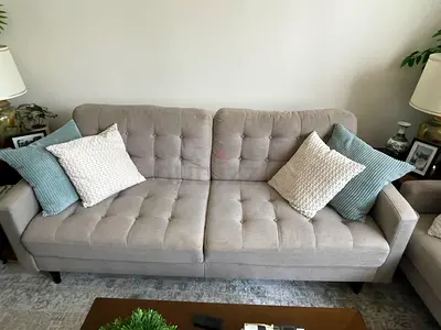 Light grey tufted 3-seater sofa in good condition