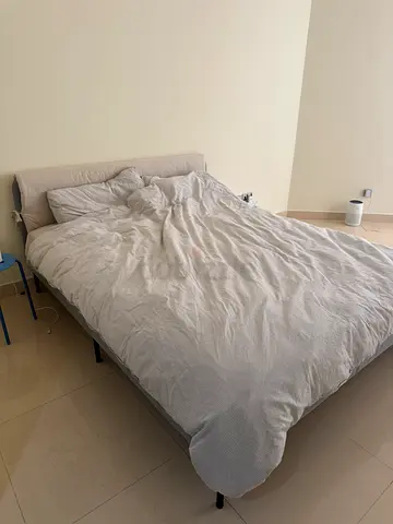 IKEA Grey fabric Queen bed with mattress - good condition
