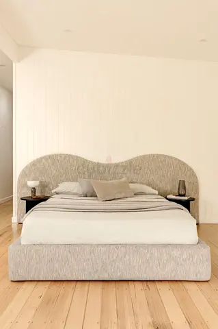 Neutral fabric platform bed with curved headboard — queen size