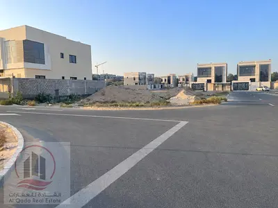Two corner plots of land for sale in Al Zahia, Ajman | Area 245m² each, price per plot 520,000 AED, freehold ownership for all nationalities