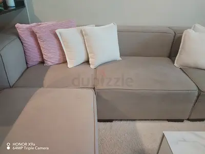 Light grey L-shaped fabric sectional sofa - good condition