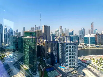 High Floor 1BR | Canal + Burj View | Corner Unit