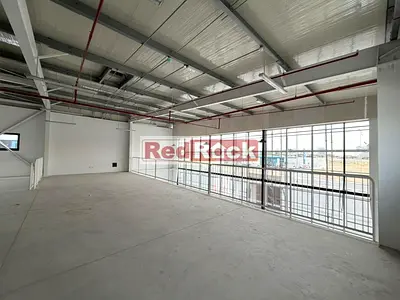 Road Facing Warehouse with Modern Glass Façade