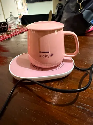 Mug with cover and warmer.