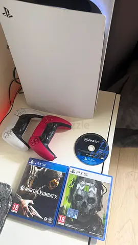 PS5 console with 2 DualSense controllers and 2 games (Mortal Kombat 11, Call of Duty)FIFA 22
