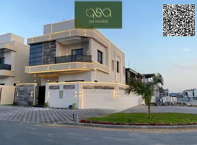 Corner villa for sale in Ajman, Al Helio 2 area, including registration fees and close to all services.
