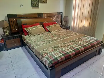 Wooden king-size bed frame with headboard and two bedside drawers, 6 floor wardrobe and dresser