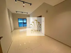 For annual rent in Ajman Al Rashidiya 1 on Khalifa St, 2BR hall, 2 baths, balcony, central AC, super