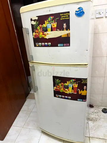 Used double-door refrigerator in working condition — small size